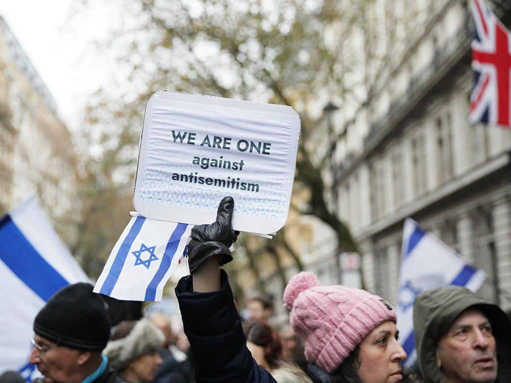 Woman protesting against antisemitism