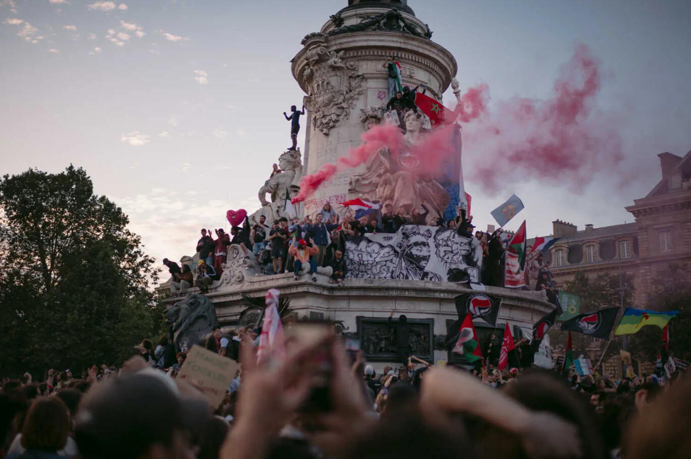 Left-wing supporters celebrate the French legislative election’s round two results.