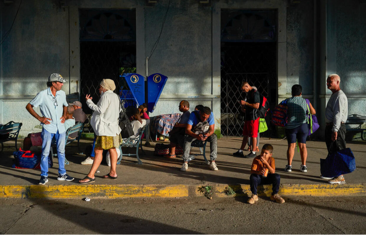 Cubans waiting outside after a power outage